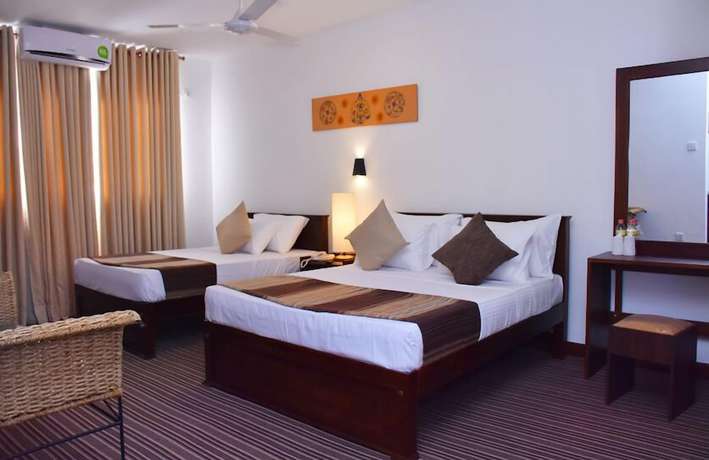 Imagen de la habitación del Hotel Mallika. Foto 11