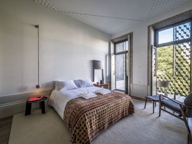 Imagen de la habitación del Hotel Malmerendas Boutique Lodging. Foto 5