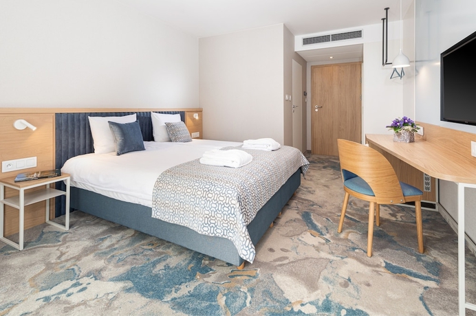 Imagen de la habitación del Hotel Maloves Spa and Resort. Foto 3