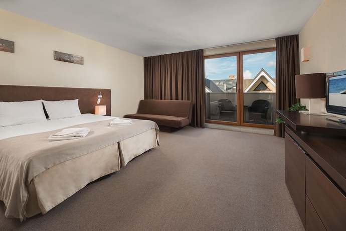 Imagen de la habitación del Hotel Maloves Spa and Resort. Foto 4