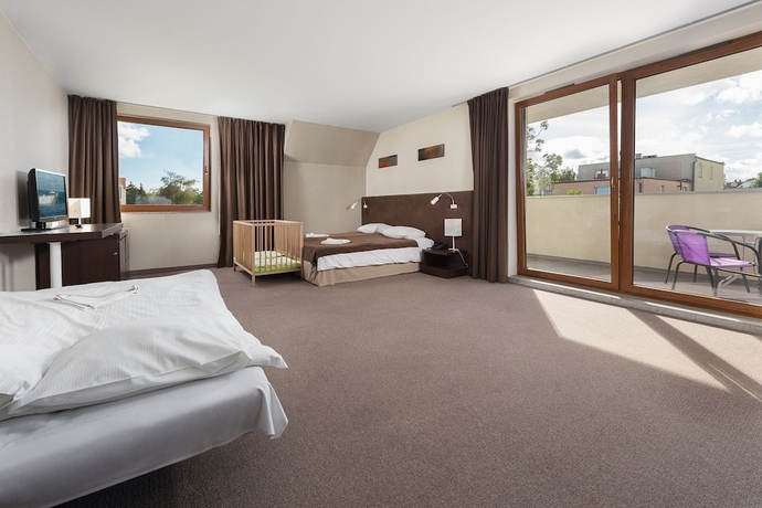 Imagen de la habitación del Hotel Maloves Spa and Resort. Foto 5