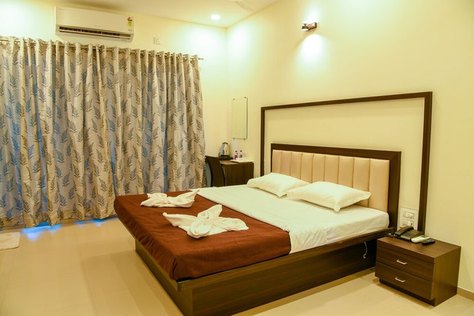 Imagen de la habitación del Hotel Malvan\'s Aishwarya. Foto 9