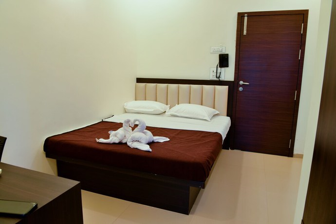 Imagen de la habitación del Hotel Malvan\'s Aishwarya. Foto 10