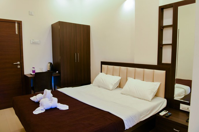 Imagen de la habitación del Hotel Malvan\'s Aishwarya. Foto 12