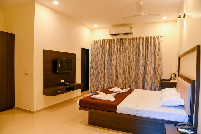 Imagen de la habitación del Hotel Malvan\'s Aishwarya. Foto 13