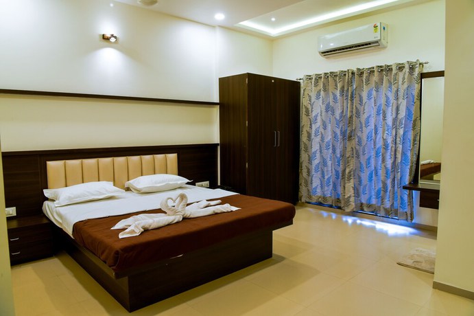 Imagen de la habitación del Hotel Malvan\'s Aishwarya. Foto 14