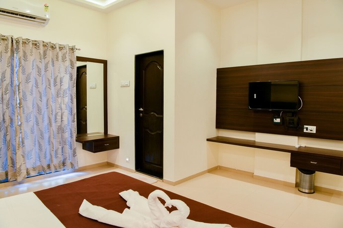 Imagen de la habitación del Hotel Malvan\'s Aishwarya. Foto 15