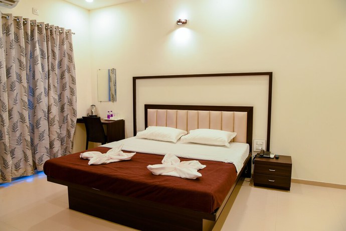 Imagen de la habitación del Hotel Malvan\'s Aishwarya. Foto 16