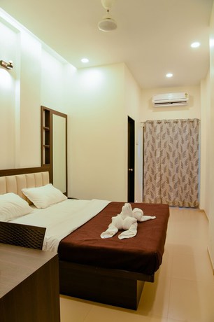 Imagen de la habitación del Hotel Malvan\'s Aishwarya. Foto 18