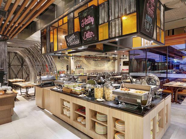 Imagen del bar/restaurante del Hotel Malyabhara. Foto 2