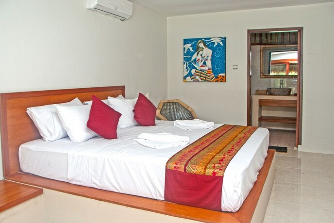 Imagen de la habitación del Hotel Mama Bella's Retreat. Foto 17