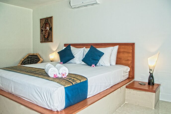 Imagen de la habitación del Hotel Mama Bella's Retreat. Foto 24