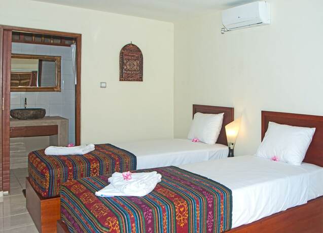 Imagen de la habitación del Hotel Mama Bella's Retreat. Foto 27