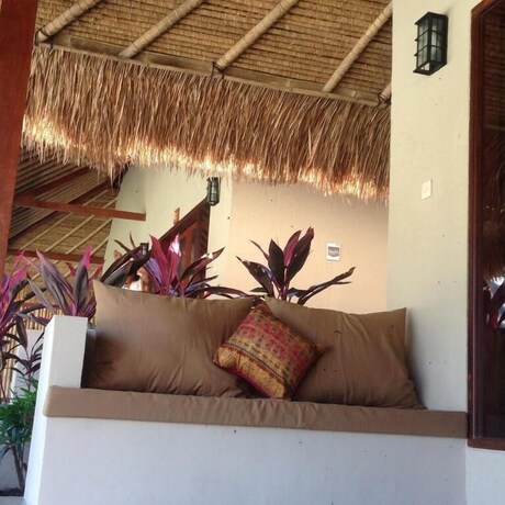 Imagen de la habitación del Hotel Mama Bella's Retreat. Foto 29