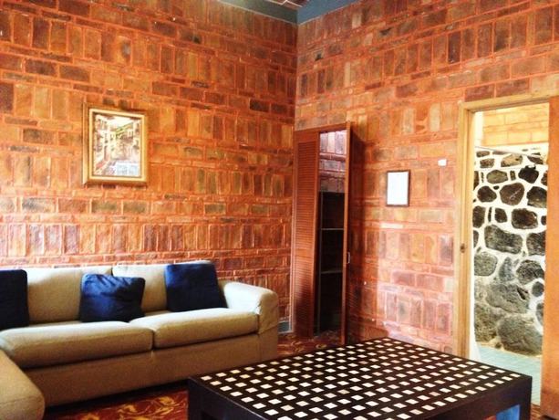 Imagen de la habitación del Hotel Mama Chuy and Villas. Foto 7