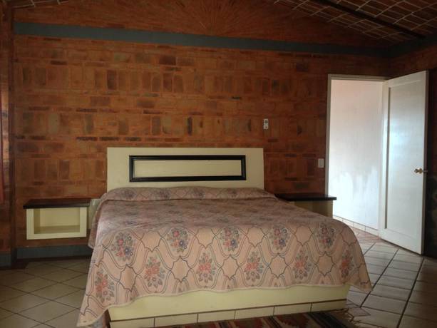 Imagen de la habitación del Hotel Mama Chuy and Villas. Foto 14