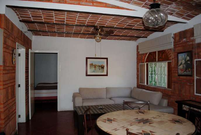 Imagen de la habitación del Hotel Mama Chuy and Villas. Foto 15