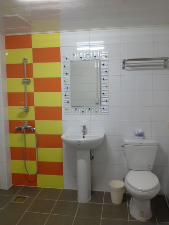 Imagen de la habitación del Hotel Mama Guest House. Foto 6