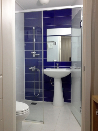 Imagen de la habitación del Hotel Mama Guest House. Foto 7