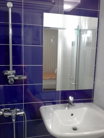 Imagen de la habitación del Hotel Mama Guest House. Foto 10