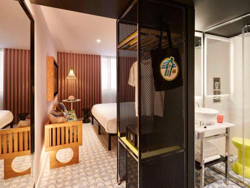 Imagen de la habitación del Hotel Mama Shelter Lisboa. Foto 15