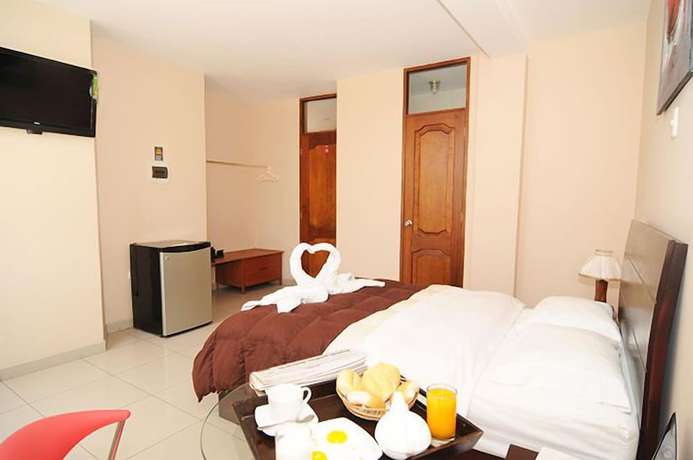 Imagen de la habitación del Hotel Mama Tina. Foto 3