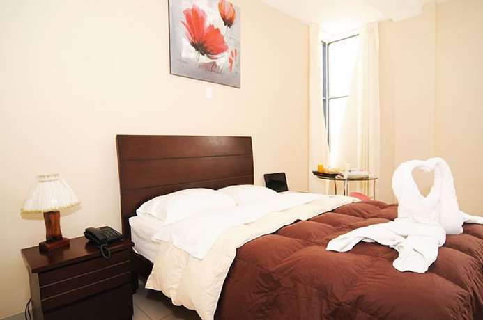 Imagen de la habitación del Hotel Mama Tina. Foto 7