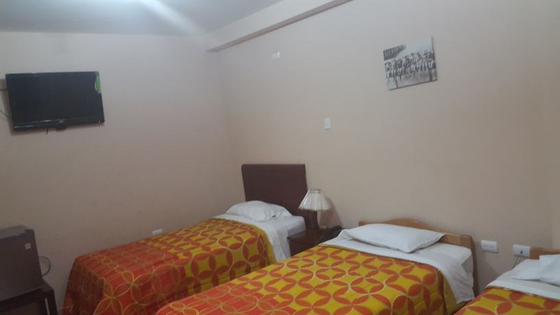 Imagen de la habitación del Hotel Mama Tina. Foto 17