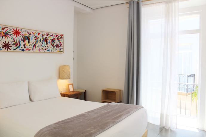 Imagen de la habitación del Hotel Mam&aacute; Carlota. Foto 2