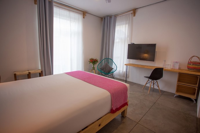 Imagen de la habitación del Hotel Mam&aacute; Carlota. Foto 6