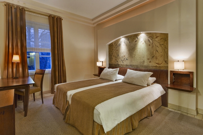 Imagen de la habitación del Hotel Mamaison Le Regina Warsaw. Foto 6