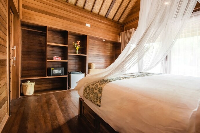 Imagen de la habitación del Hotel Mamamia Island Villa. Foto 21