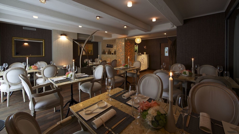 Imagen del bar/restaurante del Hotel Mama's Design and Boutique. Foto 3