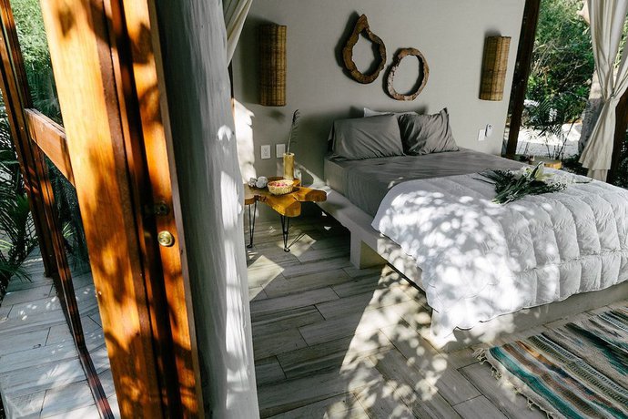 Imagen de la habitación del Hotel Mamasan Treehouses and Cabins. Foto 12