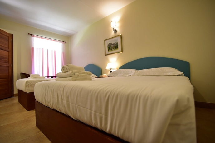 Imagen de la habitación del Hotel Mamaungpaa Hillside Resort. Foto 9