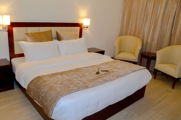 Imagen de la habitación del Hotel Mamba Point Hotel Freetown. Foto 9
