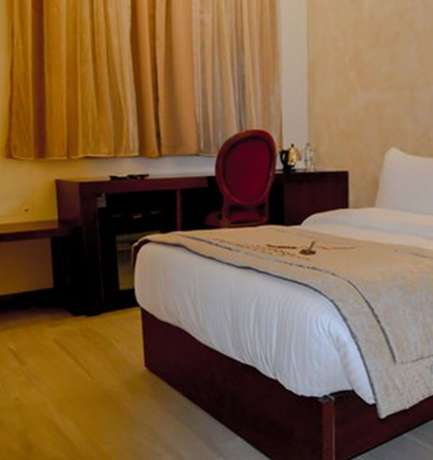 Imagen de la habitación del Hotel Mamba Point Hotel Freetown. Foto 10