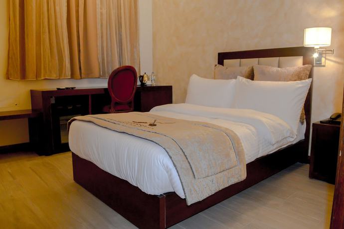 Imagen de la habitación del Hotel Mamba Point Hotel Freetown. Foto 13