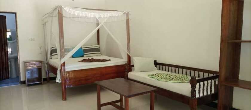 Imagen de la habitación del Hotel Mambo Beach Villas. Foto 17