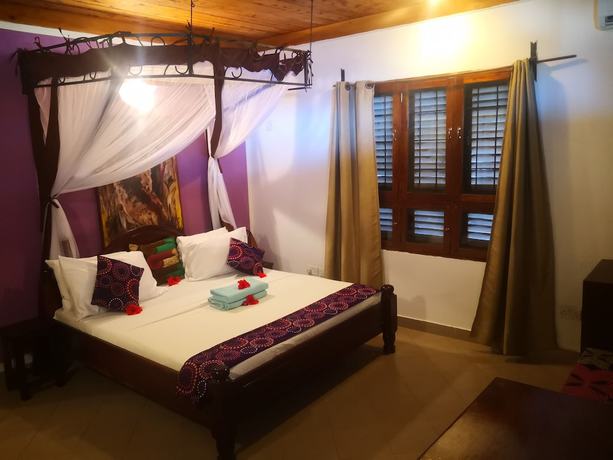 Imagen de la habitación del Hotel Mambo Ocean Resort. Foto 12