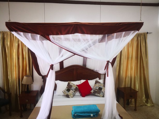 Imagen de la habitación del Hotel Mambo Ocean Resort. Foto 16