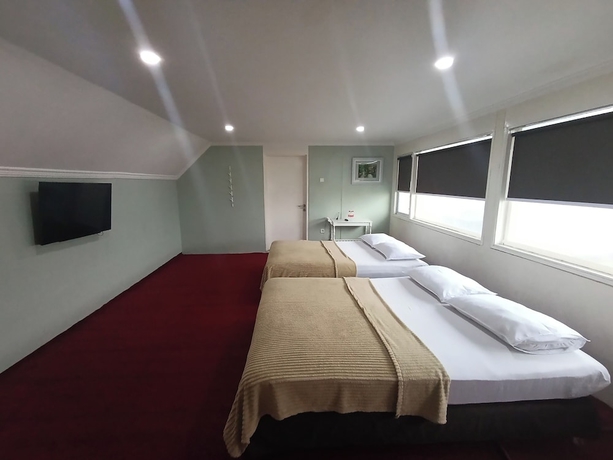 Imagen de la habitación del Hotel Mamifokobo Guest House. Foto 2