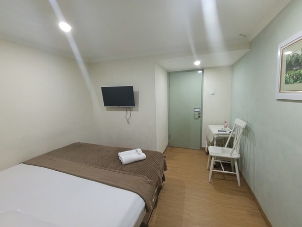 Imagen de la habitación del Hotel Mamifokobo Guest House. Foto 5