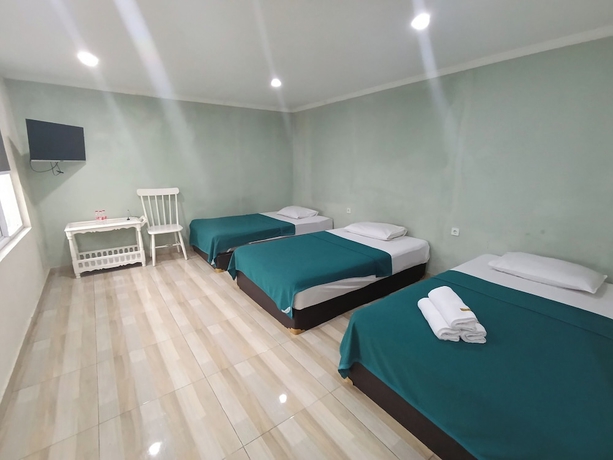 Imagen de la habitación del Hotel Mamifokobo Guest House. Foto 6