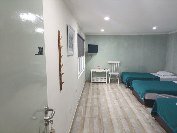 Imagen de la habitación del Hotel Mamifokobo Guest House. Foto 9