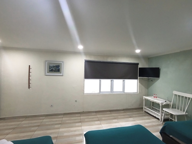 Imagen de la habitación del Hotel Mamifokobo Guest House. Foto 11