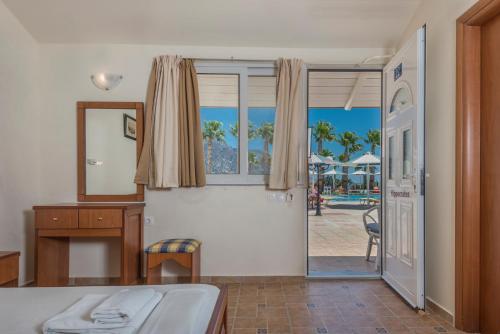 Imagen de la habitación del Hotel Mammis Beach. Foto 9