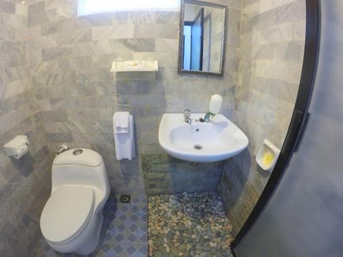 Imagen de la habitación del Hotel Mamo Uluwatu. Foto 4