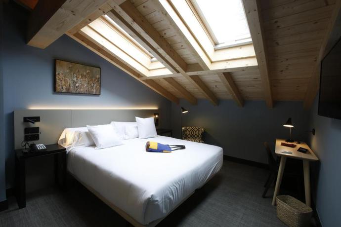 Imagen de la habitación del Hotel M&UGA Hotela. Foto 2