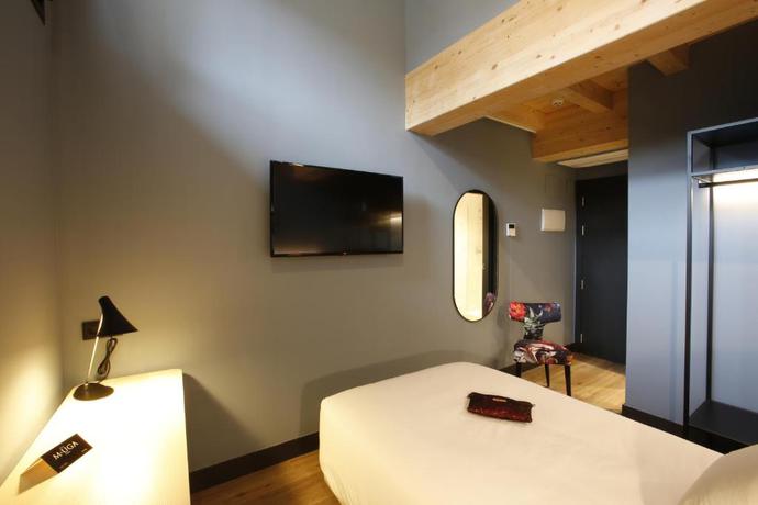 Imagen de la habitación del Hotel M&UGA Hotela. Foto 4